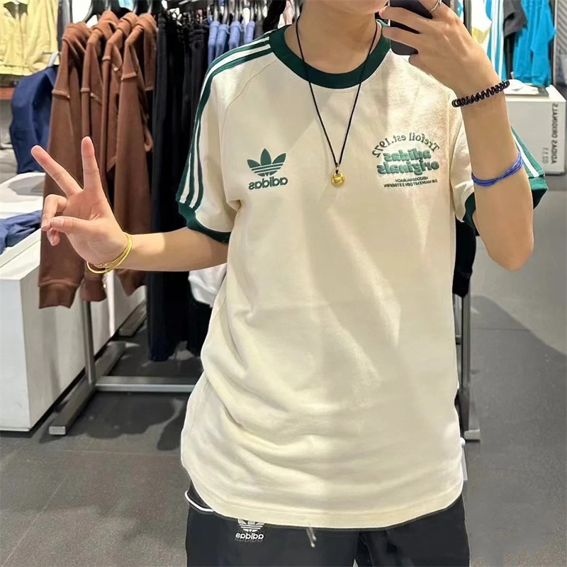 Adldas เสื้อยืดคู่ลําลองเสื้อยืดคอกลมมีสไตล์หลวมเรียบง่ายแขนสั้น