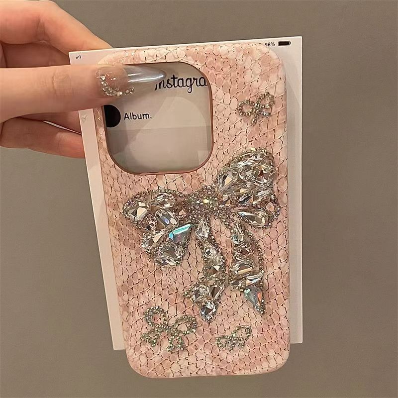 แฟชั่นglitter Rhinestoneโบว์เคสโทรศัพท์สําหรับIPhone 16 Pro Maxใช้งานร่วมกับIP 14 15 Pro Max 11 12 13 ProMaxประกายเพชรงูรูปแบบผิวฝาครอบ