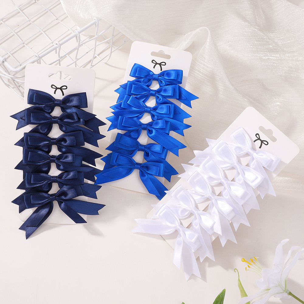 2pcs พู่กิ๊บหลายชั้นสีทึบสำหรับเด็กสาว พร้อมโบว์และริบบิ้น ของขวัญอุปกรณ์แต่งผม