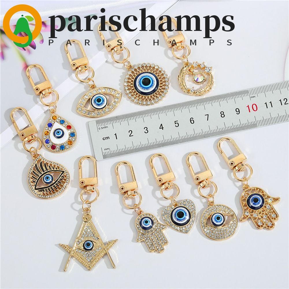 PARISCHAMPS Evil Eye พวงกุญแจ Evil Eye Key Chain Collection รถอุปกรณ์เสริมคลาสสิกของขวัญ Lucky กระเป๋าจี้อุปกรณ์เสริมพวงกุญแจมือพระพุทธรูป