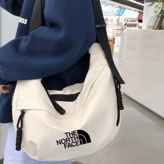 ใหม่แฟชั่น Simple North ขนมปังกระเป๋า Ultra-Light Water-Repellent ผู้ชายผู้หญิงสไตล์เดียวกันไหล่กระเป๋า Casual All-Match ขนาดใหญ่สุภาพสตรี Mes