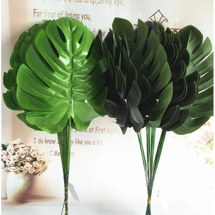 12 ชิ้น/เซ็ตพืชประดิษฐ์ Tropical ปาล์มใบสีเขียว Monstera ใบปลอม Faux สําหรับงานแต่งงานตกแต่งบ้าน DIY พืชปลอม