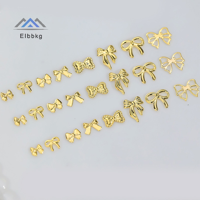 Eibbkg 50pcs โลหะ Bowknot เล็บตกแต่ง Silver Gold เล็บ Ch DIY เล็บออกแบบเครื่องประดับอุปกรณ์เสริมเครื่องมือขาย