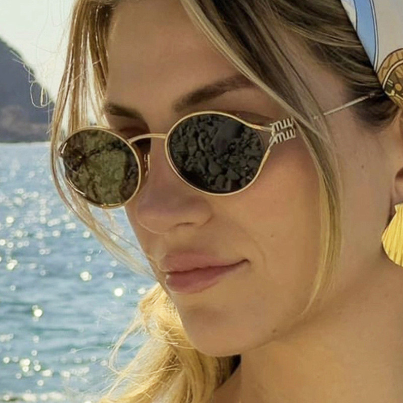 ใหม่ยุโรปและอเมริกาแว่นตากันแดดรูปไข่กลวงโลหะแว่นตากันแดดป้องกันรังสีอัลตราไวโอเลตถนนยิงแว่นกันแดดทุกการแข่งขัน