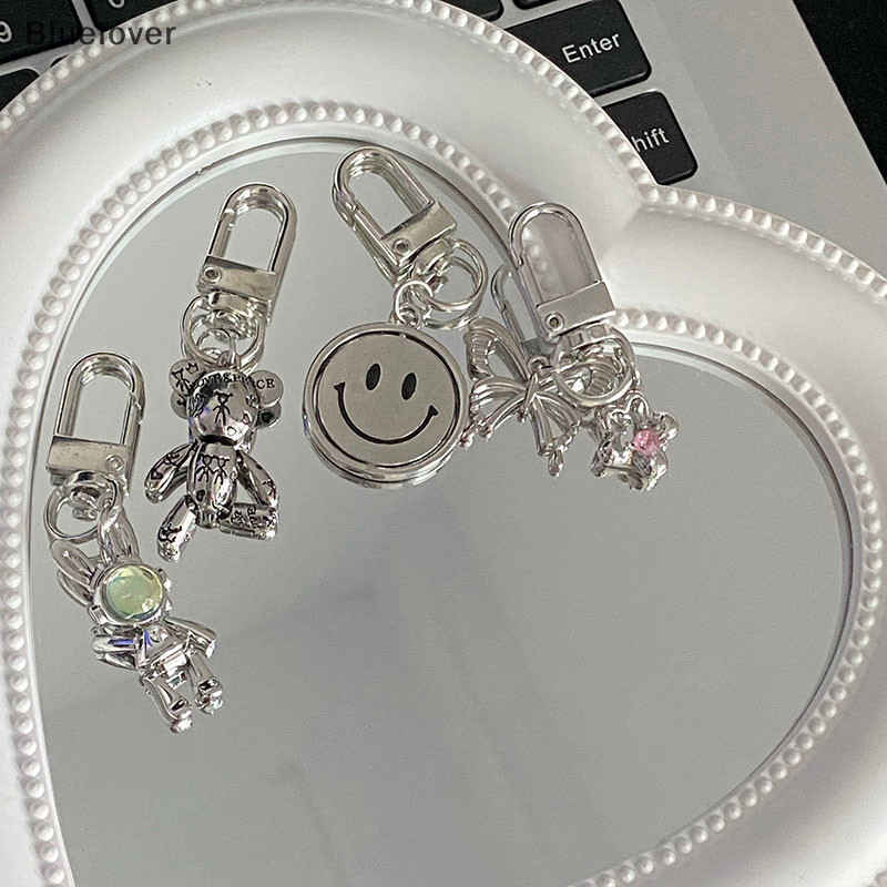 Bluelover บุคลิกภาพ Cool Crowe Heart Cross Key Chain Creative Revolving Smiley Face กระเป๋าจี้สําหรับคนรักของขวัญใหม่