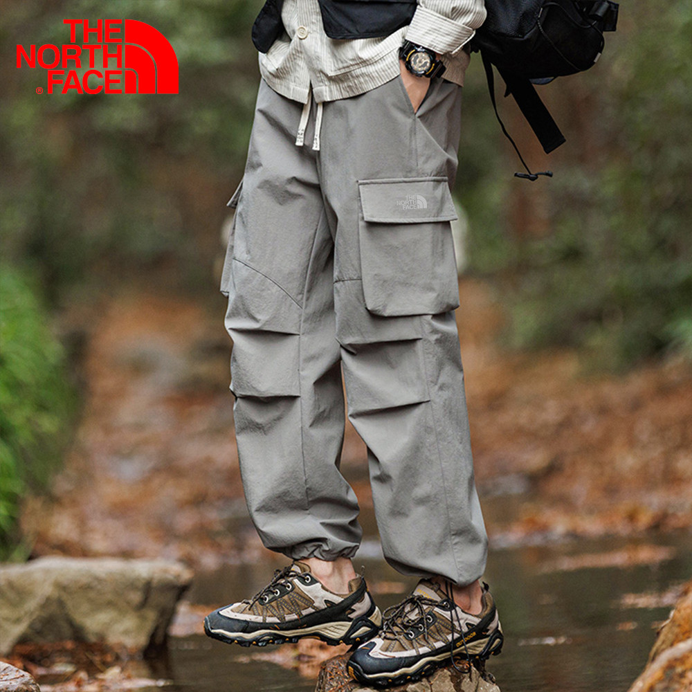 The North Face กางเกงทํางานผู้ชายฤดูใบไม้ร่วง Paratrooper ชาร์จกางเกงอเมริกันฟังก์ชั่นกลางแจ้งกันน้ําหลวมขนาดใหญ่ตรงกางเกงลําลอง