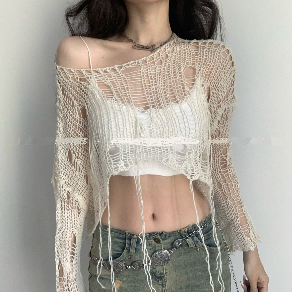 เสื้อเบลาส์ฤดูใบไม้ผลิและฤดูใบไม้ร่วงสไตล์อเมริกันซีทรูหลวมหลวมขี้เกียจถักช่องโหว่ใหญ่กลวงถักสาวฮอตสไตล์เกาหลีที่ทรุดโทรมทุกแมทช์ลุคง่าย v9p3