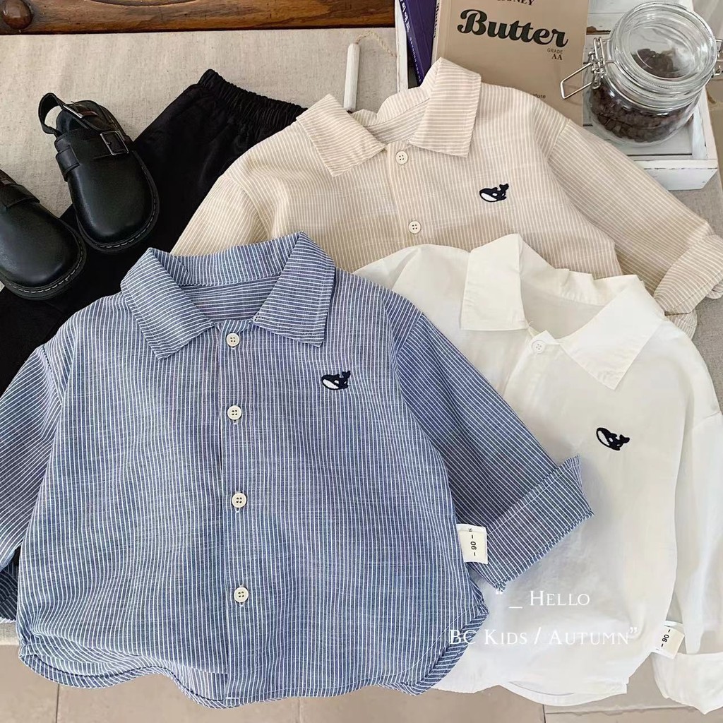 เสื้อเชิ้ตแขนยาวเด็กชายฤดูใบไม้ผลิฤดูใบไม้ร่วงแฟชั่นสไตล์ใหม่เวอร์ชั่นเกาหลีผ้าฝ้ายแท้ปกการ์ตูนเย็บปักถักร้อยสีทึบเรียบง่ายหล่อสบายๆทุก