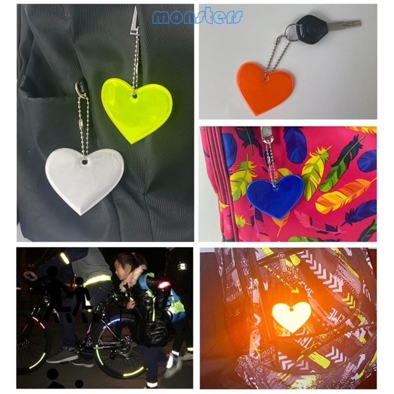 Mon Heart Shape สะท้อนแสงพวงกุญแจกระเป๋าจี้ PVC Reflector Keyrings สําหรับขี่จักรยาน
