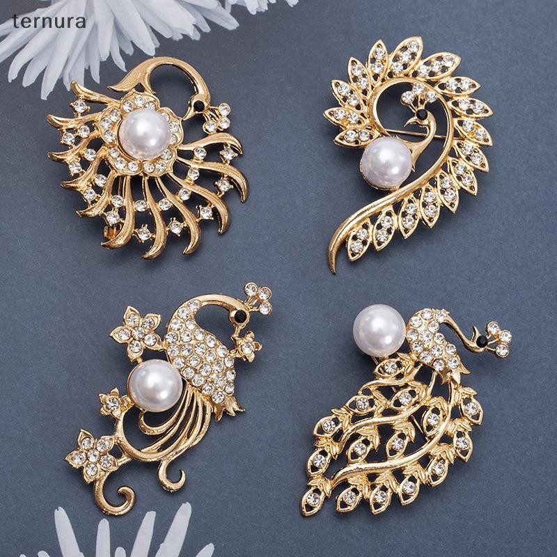 Ternura Rhinestone ไข่มุกนกยูงสัตว์ Corsage คลาสสิกคริสตัลนกยูงเข็มกลัด Pins สําหรับผู้หญิงจัดเลี้ยงงานแต่งงานเครื่องแต่งกายแฟชั่นเครื่องประดับใหม่