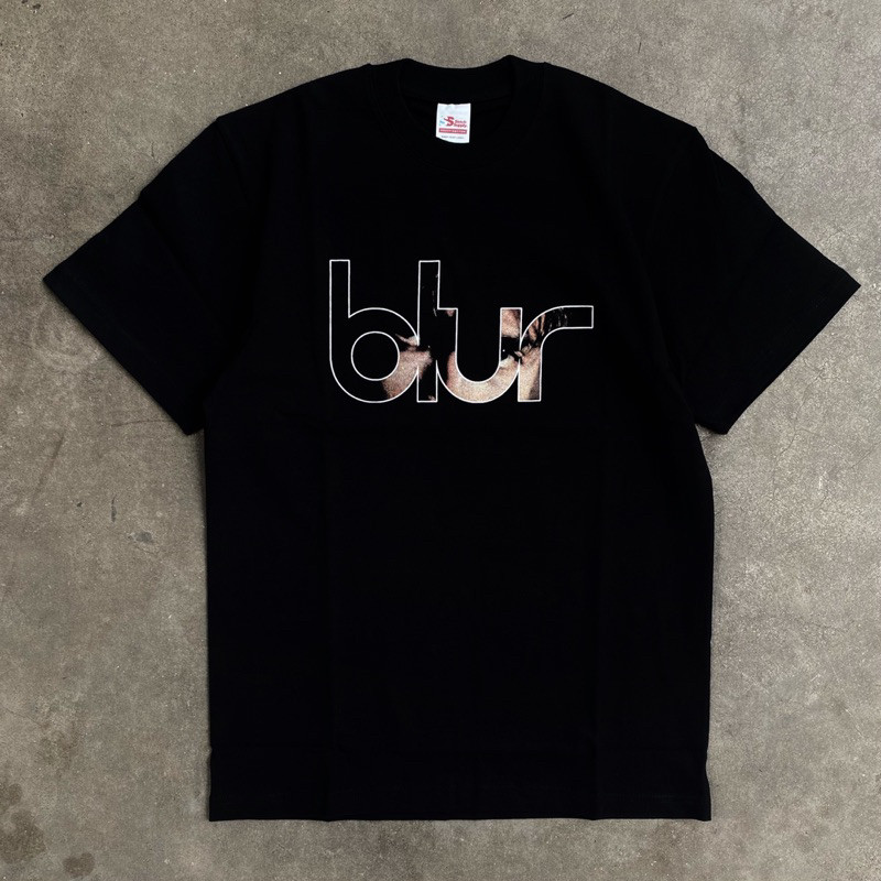 Blur - เสื้อยืด Damon Albarn Face - สีดํา