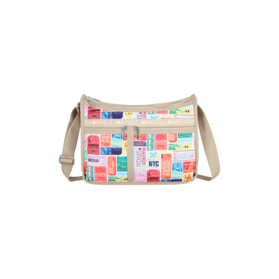 กระเป๋าสะพายข้าง LeSportsac Deluxe Everyday - ป้ายเดินทาง