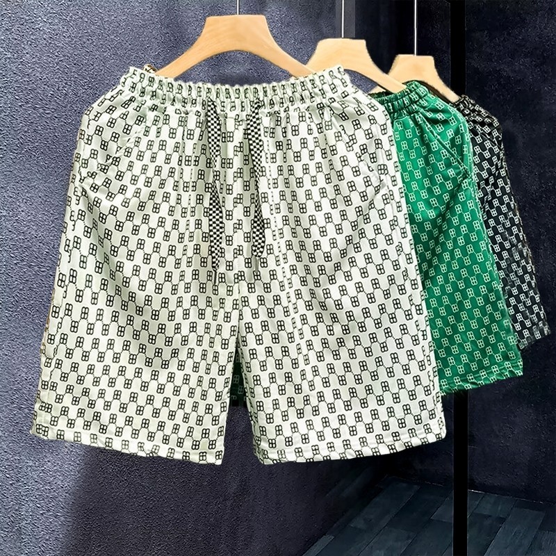 M-5XL กางเกงขาสั้นผู้ชาย ลําลอง ทรงหลวม ไซส์ใหญ่ ผ้าไหมน้ําแข็งมีน้ําหนักเบาและระบายอากาศได้ดีแฟชั่นชาย