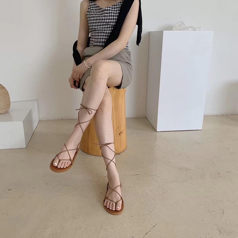 Soft Sole Super Hot Flat Flip-Flops รองเท้าชายหาดโรมันรองเท้าแตะผู้หญิงแฟชั่น Seaside Vacation Lace-Up รองเท้าแตะผู้หญิง、软底超火平底夹趾罗马沙滩鞋凉鞋女时尚海边度假绑带凉鞋女