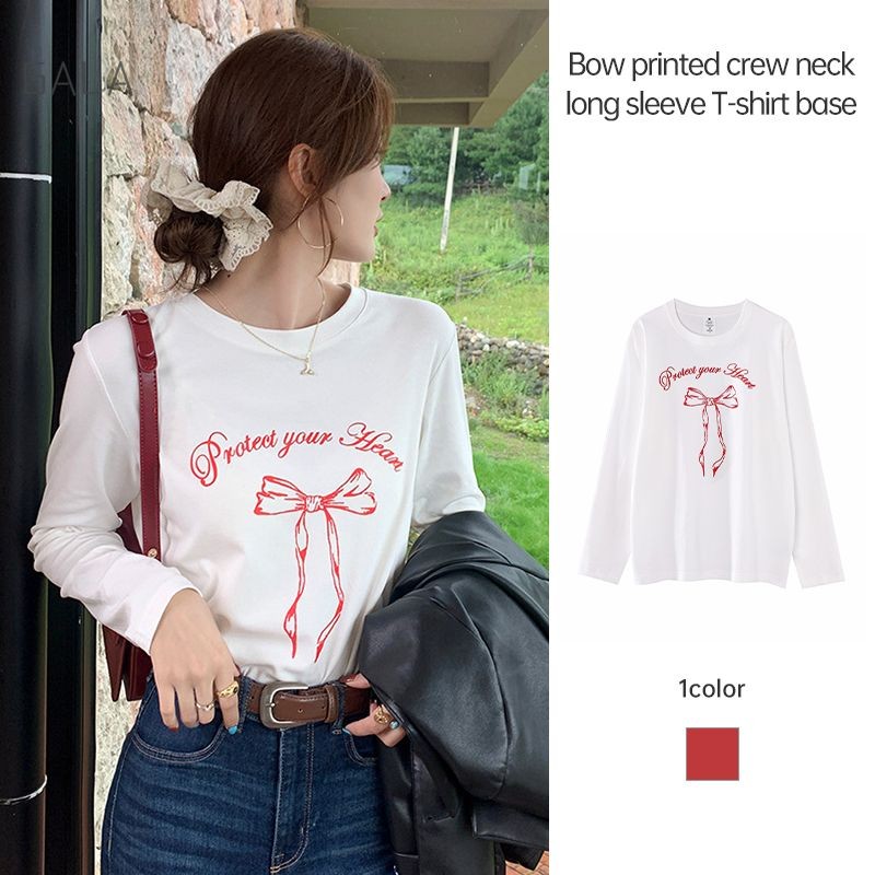 เสื้อยืดพิมพ์ลายโบว์ผู้หญิงหลวมคอกลม Bottoming เสื้อผ้าฝ้ายแท้เสื้อยืดแขนยาว GA