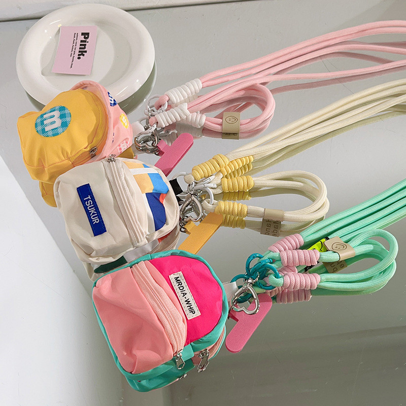 น่ารักอินเทรนด์ M bean กระเป๋าเก็บเหรียญเคสโทรศัพท์เชือกแขวน Travel Anti Loss Universal