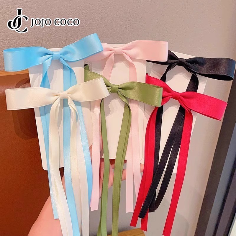 Jojo COCO กิ๊บติดผมโบว์ริบบิ้นหวานเครื่องประดับผมคลิปปากเป็ดสไตล์เกาหลีของผู้หญิง