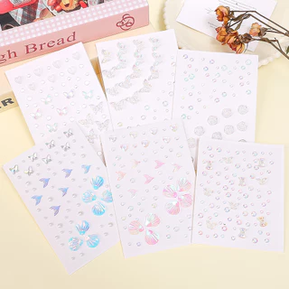 [3-5 วันมาถึง]สติกเกอร์เพชรคริสตัลเรืองแสงสําหรับใบหน้า/ร่างกาย, การออกแบบนางเงือกผีเสื้อพร้อมอะคริลิคอีโค-เวทีแต่งหน้า&พรรคอุปกรณ์1/5ชิ้น
