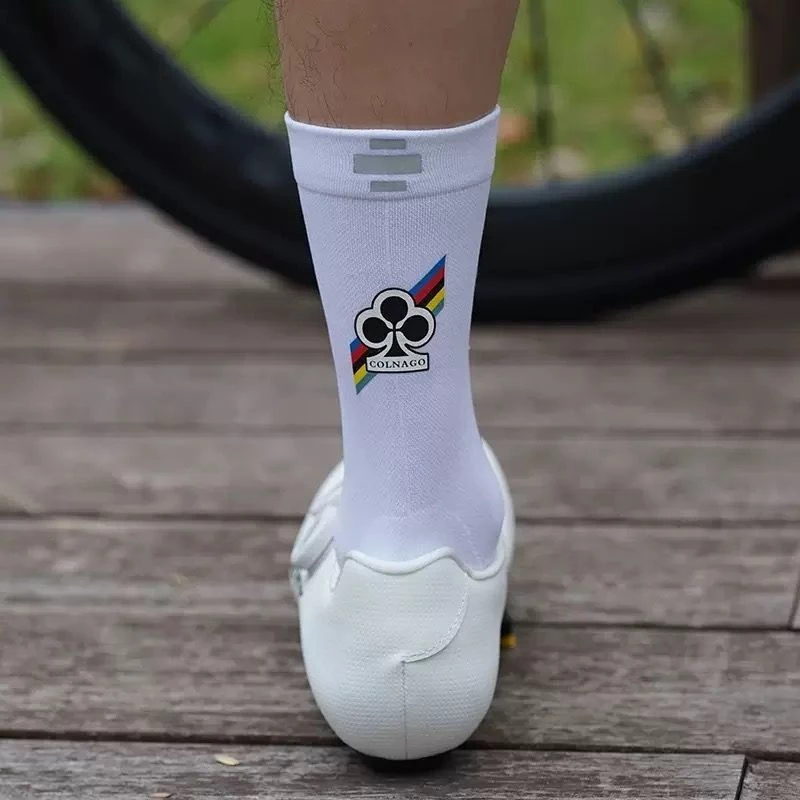 [ในสต็อก] UAE/UCI Tour de France ถุงเท้าปั่นจักรยานมืออาชีพแบบเดียวกัน, ถุงเท้าปั่นจักรยานถนนสะท้อนแสงกลางคืน, ถุงน่องกีฬากลางแจ้ง, ถุงน่องปั่นจักรยาน