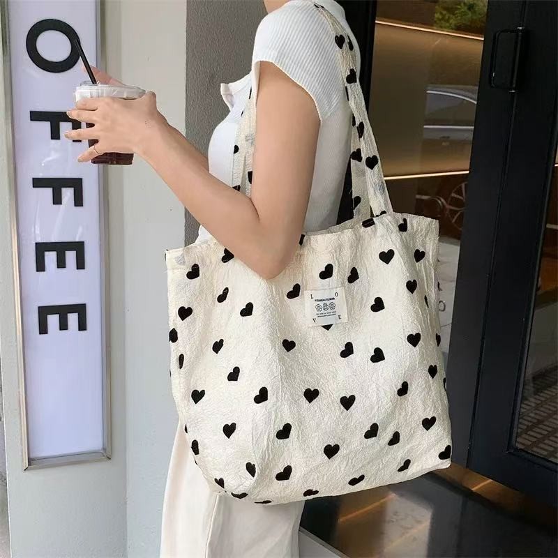 กระเป๋า tote ผ้าแคนวาส สไตล์ใหม่ พื้นที่เก็บของขนาดใหญ่ ดีไซน์เรียบง่ายแต่มีสไตล์