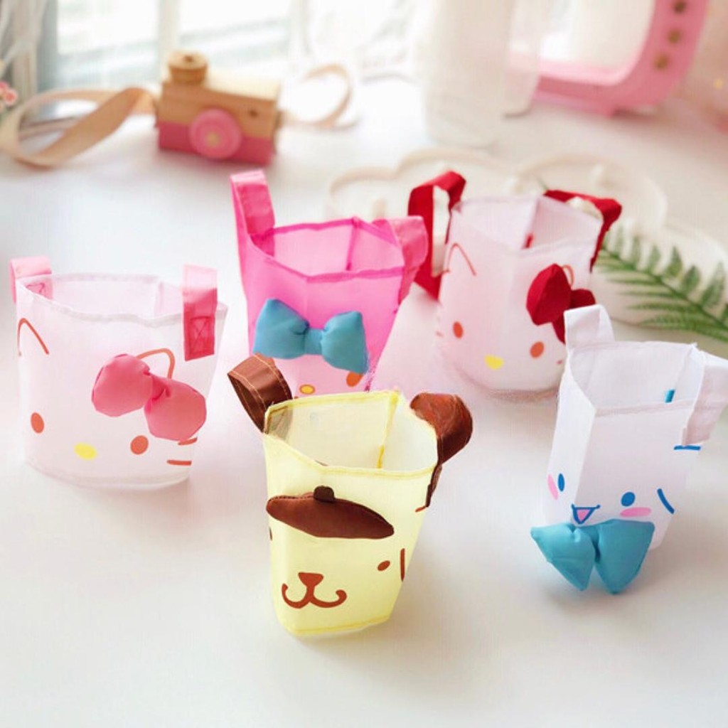 🥤 ถูกใจสายรักษ์โลก ปลอกแก้วน้ำ ลายการ์ตูน มีสายหิ้วพร้อมช่องใส่หลอด ลดการใช้พลาสติกได้อีกด้วย