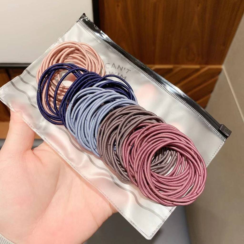 ยางรัดผมสีพื้น สีพาสเทล สไตล์เกาหลี แพ็ค100เส้น พร้อมซองใส่ ส่งเร็ว🚚(เลือกสีได้)[จัดส่งจากประเทศไทย]