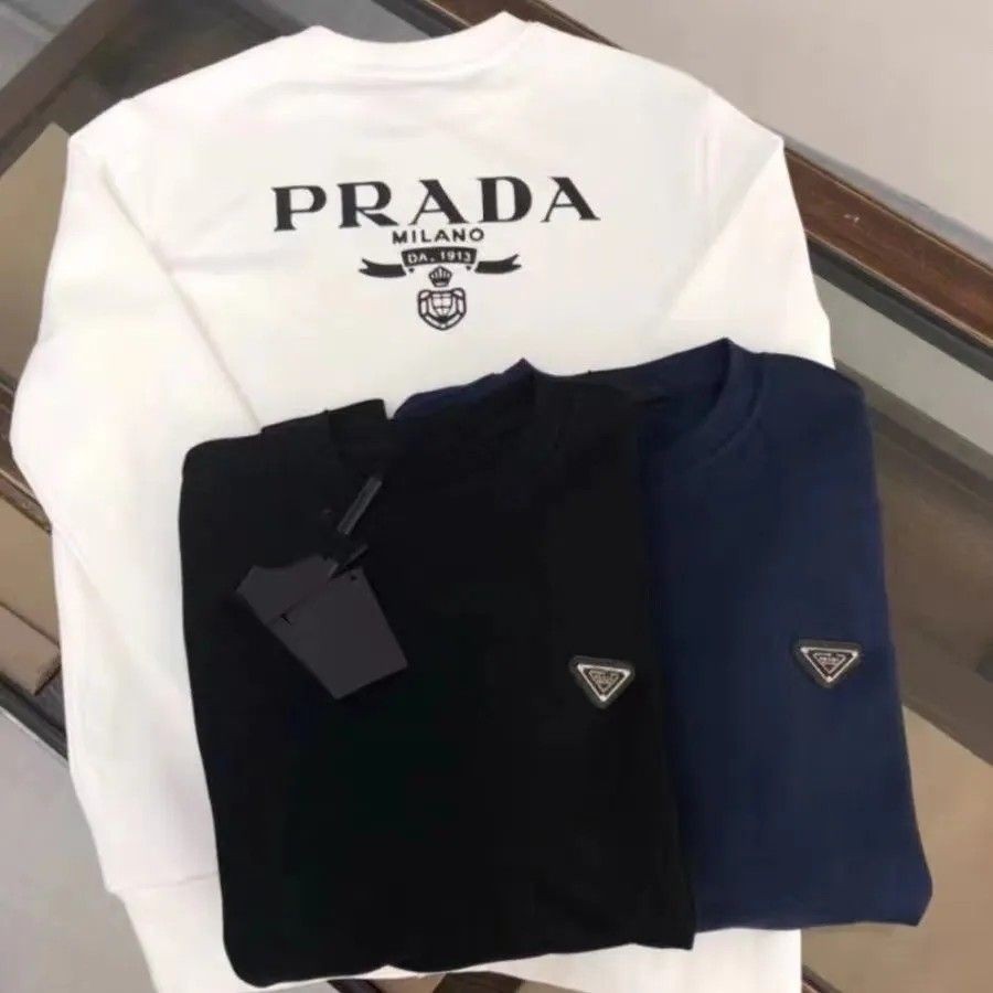 PRDA ฤดูใบไม้ร่วงและฤดูหนาวสามเหลี่ยม Micro Seal พิมพ์ตัวอักษรแบรนด์อินเทรนด์รอบคอเสื้อสวมหัวหลวมสบา