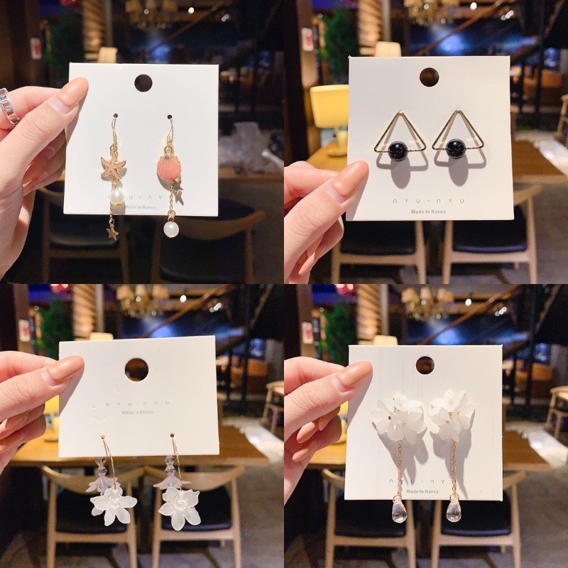 ต่างหูอุปกรณ์เสริมพู่มุก 2024 ฤดูร้อนใหม่แฟชั่นต่างหูมุกอเนกประสงค์