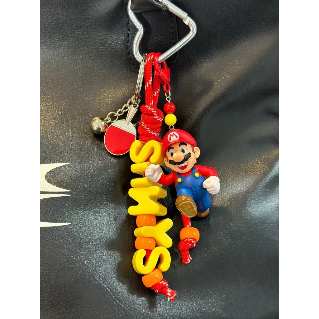 Sa Mario ปิงปองพวงกุญแจจี้กระเป๋าแขวน Mario Sun Yingsha อุปกรณ์ต่อพ่วงจี้ของที่ระลึก LF9.28