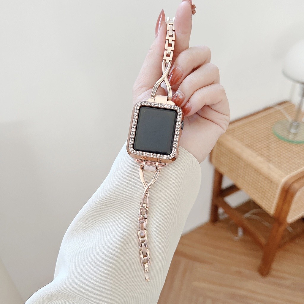 สายโลหะรูปตัว X แฟชั่น+เคส(ตัวควบคุมของขวัญ) ผู้หญิงหรูหราสําหรับสาย แอปเปิล ดู ชุด 9 8 7 กับ 6 5 4 3 2 1 สายขนาด 38/40/41/42/44/45/49 มม.นาฬิกาสมาร์ท ฉันดู