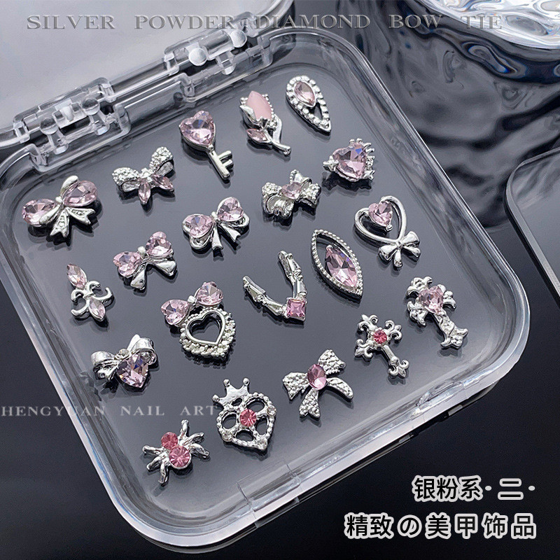 5ชิ้นร้อนขายกุทัณฑ์เล็บเครื่องประดับแสงหรูหราสาวเพชรสีชมพูโลหะผสมข้ามรักกุญแจอุปกรณ์ตกแต่งเล็บ