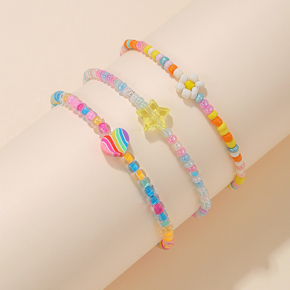 สร้อยข้อมือลูกปัดข้าวสีสไตล์โบโฮและหวานสำหรับผู้หญิง สวมใส่ง่ายและสวยงาม