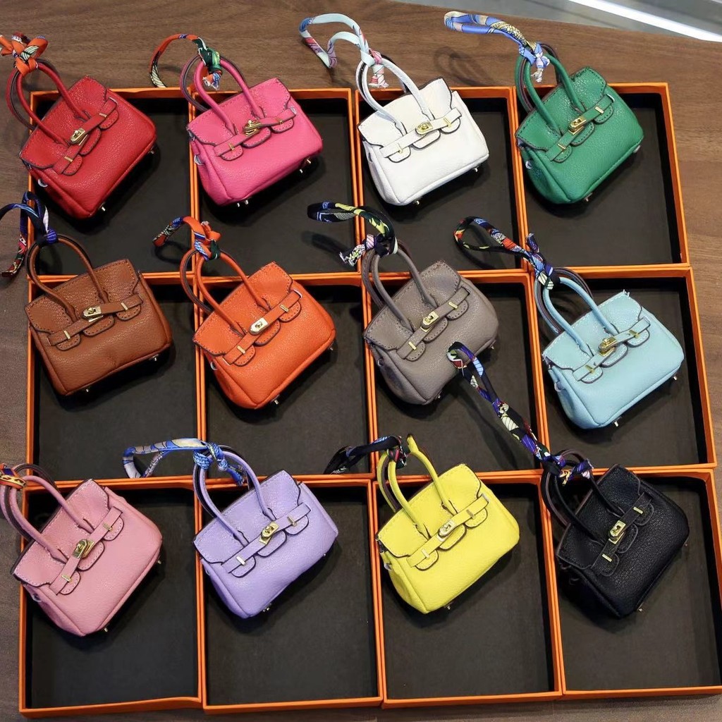 กระเป๋าใบเล็ก ดีไซน์น่ารัก ใส่กุญแจรถ/หูฟัง/ลิปสติก สีแพลตตินัม DETUA