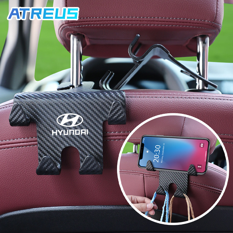 1ชิ้น Hyundai ตะขอเเขวนในรถยนต์ ตะขอเก็บของ ตะขอที่แขวนของหลังเบาะรถยนต์ ที่วางโทรศัพท์มือถือในรถยนต์ ตะขอเอนกประสงค์บนรถ สําหรับ Hyundai Ioniq 5 6 Creta Stargazer Kona Elantra N H1 Staria