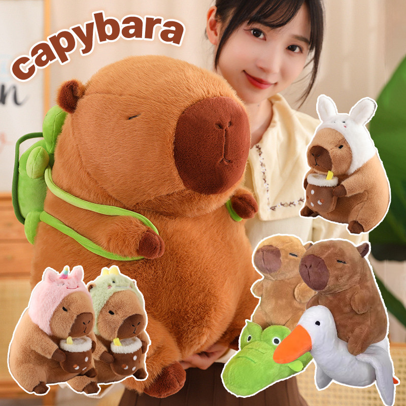 พร้อมส่ง Capybara ตุ๊กตาคาปิบารา ตุ๊กตาผ้ากํามะหยี่ขนนิ่ม พร้อมกระเป๋าเป้สะพายหลัง น่ารัก ของเล่นสําหรับเด็กผู้หญิง