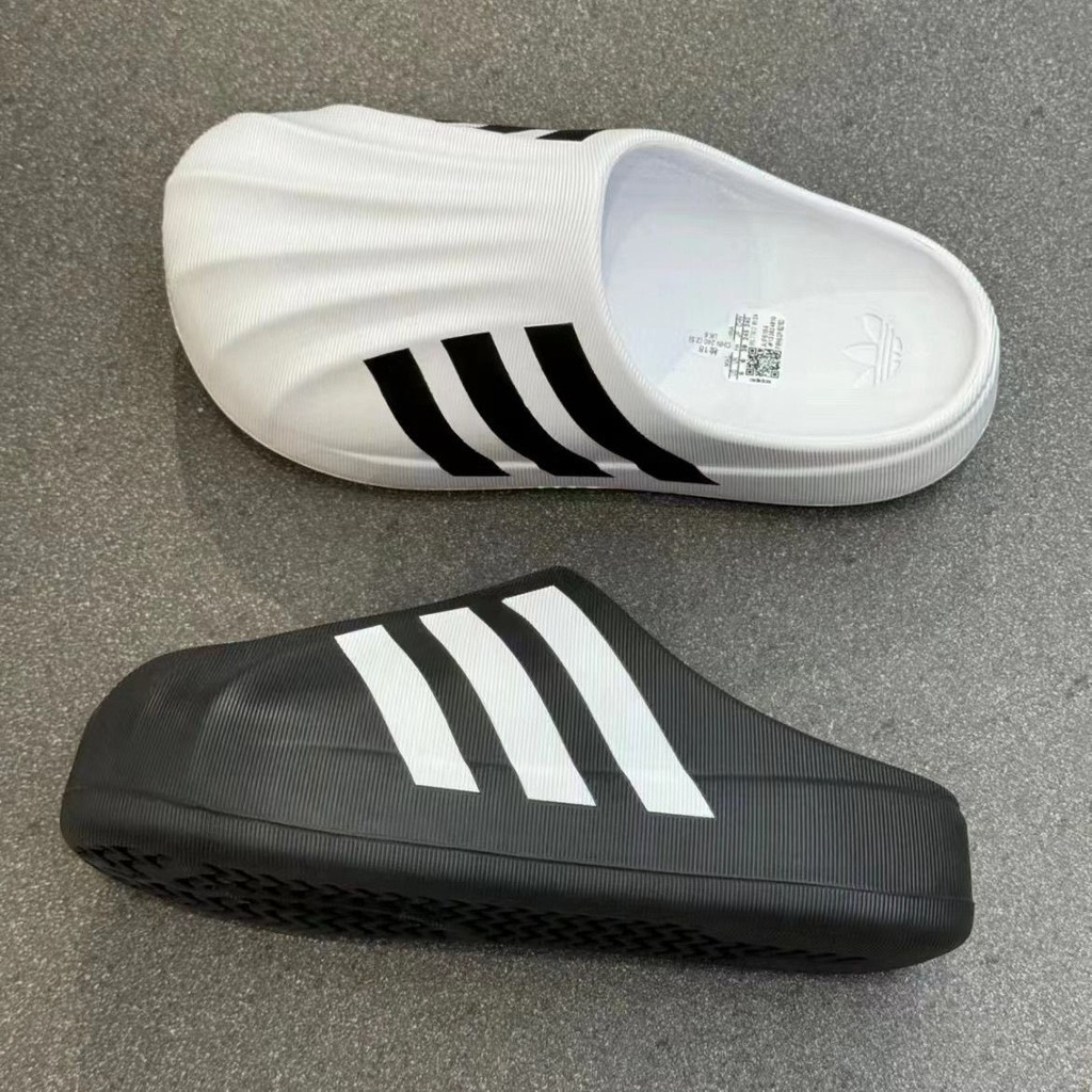 Adifom SUPERSTAR MULE ผู้ชายแนวโน้มรองเท้าแตะฤดูร้อนใหม่ EVA ด้านล่างนุ่ม Cloud สไลด์รองเท้าชายหาดชายเหมาะสําหรับในร่มและกลางแจ้ง I64WS