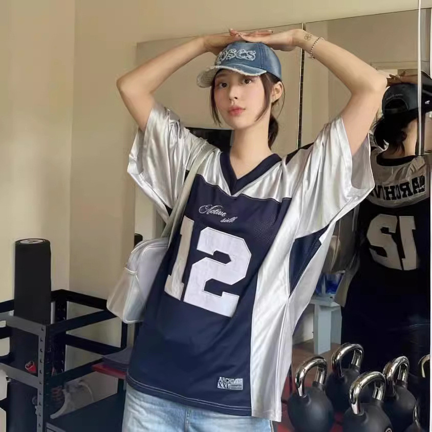 ฤดูร้อนอเมริกันย้อนยุคย์แขนสั้นเสื้อยืดสําหรับผู้หญิงคอวีหลวมขนาดใหญ่สายการบินถนนเสื้อยืดลําลองแร็กแลนแขนด้านบน