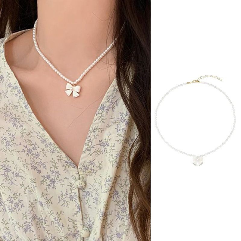 aidderse.thSummer Pearl Bow จี้สร้อยคอหญิง Niche Design High-end แฟนสร้อยคอ-