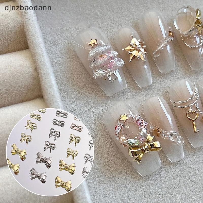 [DJNZ] 10pcs เล็บ Ch 3D คริสตัล Rhinestones Bow Nail Art เครื่องประดับโลหะผสม Bow Tie Gold Shinny อุปกรณ์เล็บเล็บ Salon ของขวัญ NGSS