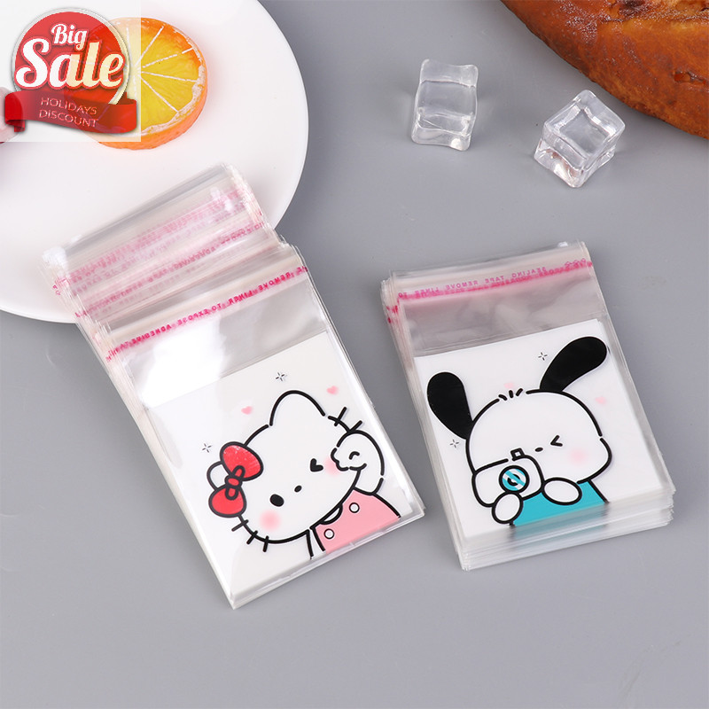 Af 100 ชิ้นน่ารัก Hello Kitty Pochacco โปร่งใส Ziplock กระเป๋ากันน้ํา Candy บิสกิตถุงปิดผนึกด้วยตนเอ