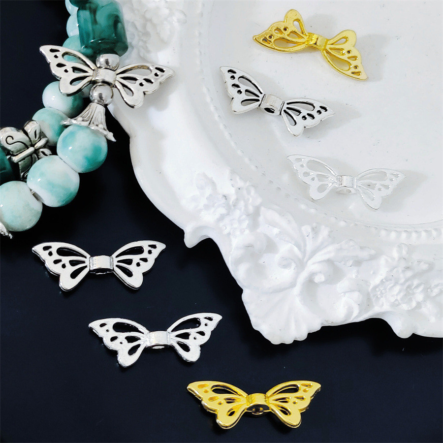 50pcs ผีเสื้อปีกลูกปัด DIY สร้อยข้อมือลูกปัดเครื่องประดับขายส่ง