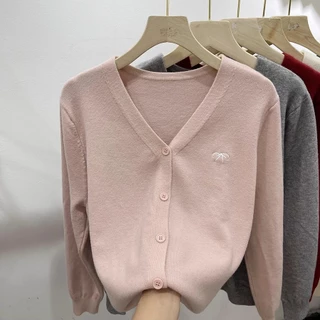 ฤดูใบไม้ร่วงเสื้อสเวตเตอร์ถักคอวีสไตล์ใหม่ผู้หญิงข้าวเหนียวนุ่มทุกการแข่งขันเสื้อถักสไตล์ตะวันตก