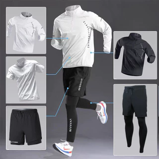 เสื้อกีฬาแห้งเร็วแขนยาวครึ่งซิป unisex สำหรับกิจกรรมออกกำลังกายต่าง ๆ เช่น การขี่จักรยานและการวิ่ง สีเทาและสีดำ
