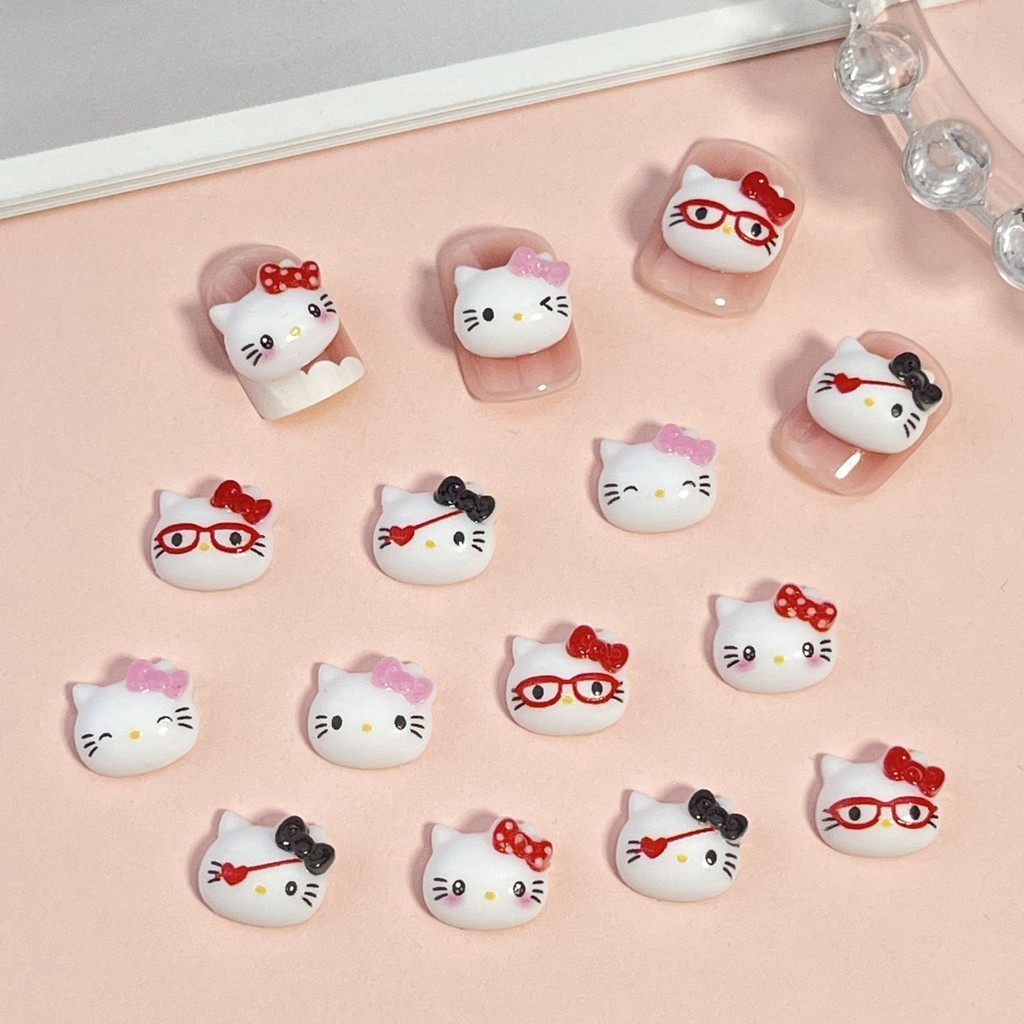 ใหม่ Hello Kitty การ์ตูนอุปกรณ์แต่งเล็บน่ารักขี้เล่นสามมิติโบว์ kt หัวแมว diy อุปกรณ์ทําเล็บ