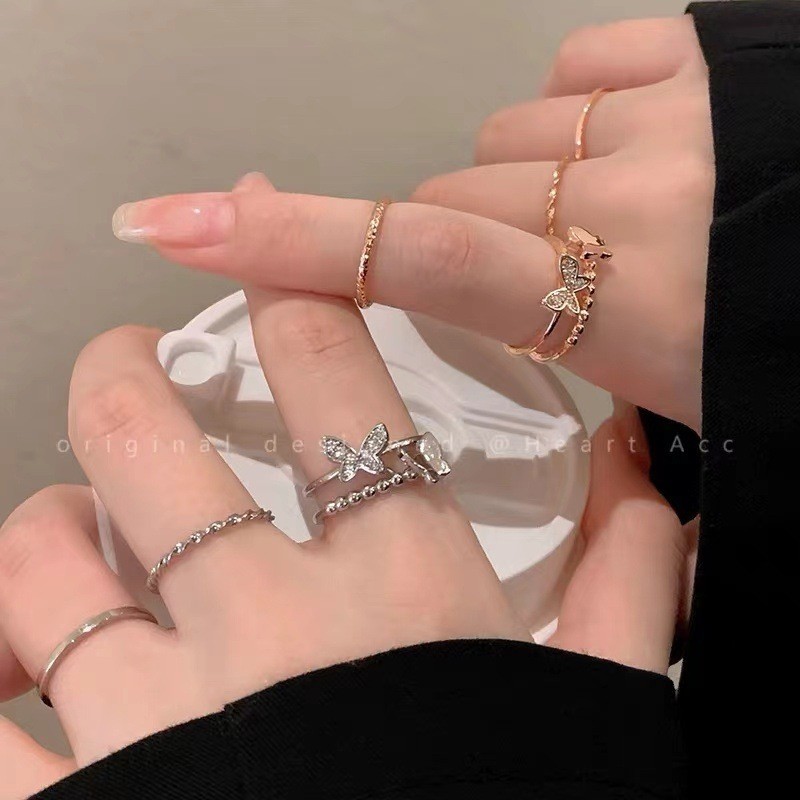 ชุดแหวนผีเสื้อสี่ชิ้นที่สวยหรูสําหรับผู้หญิงการออกแบบเฉพาะแหวนนิ้วชี้ซ้อนฝังไมโคร
