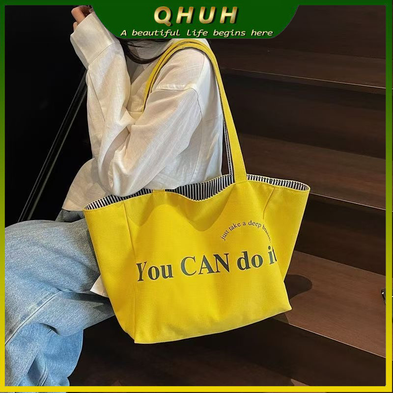 กระเป๋าผ้าใบดีไซน์เกาหลีสำหรับผู้หญิง แบบสองด้าน ลายกระเป๋า tote ความจุมาก เรียบง่าย สบาย ๆ สีเหลือง