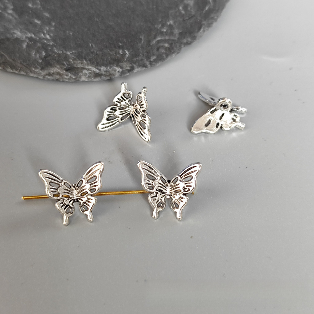 50pcs กลวงผีเสื้อคั่นลูกปัดดอกไม้ DIY สร้อยข้อมือลูกปัดเครื่องประดับขายส่ง - รูปที่ 2