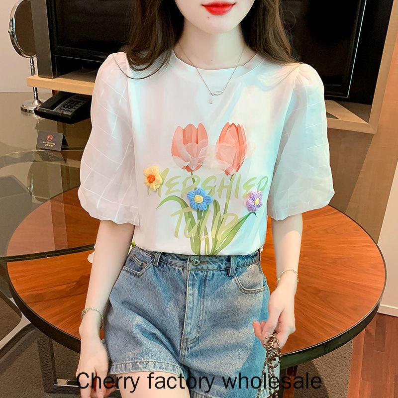 แฟชั่นผู้หญิงสไตล์ใหม่สีขาวพัฟแขนผ้าฝ้ายแท้แขนสั้นเสื้อยืดสามมิติดอกไม้อายุ @
