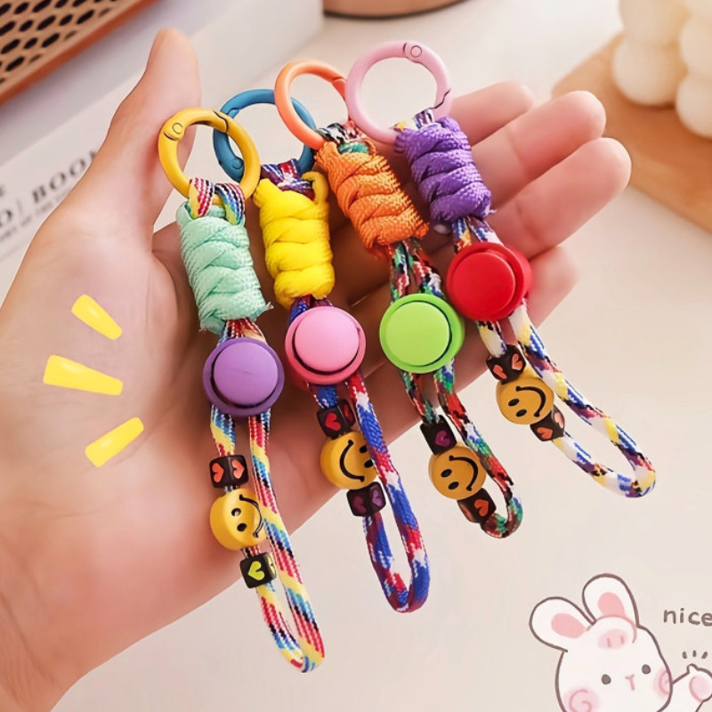 สายคล้องข้อมือหัวใจมีความสุขการออกแบบทอมือพวงกุญแจโทรศัพท์สากลสําหรับผู้ชายผู้หญิง