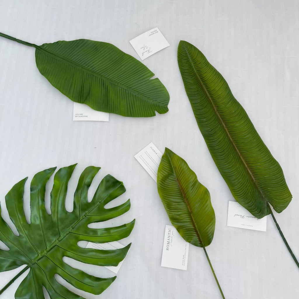 จําลอง Plantain Leaf Fan Sunflower Leaf Turtle Leaf ดอกไม้จําลอง Tropical Rainforest งานแต่งงานภูมิทัศน์ Storefront ตกแต่งดอกไม้ปลอมดอกไม้ผ้าไหม Leaf